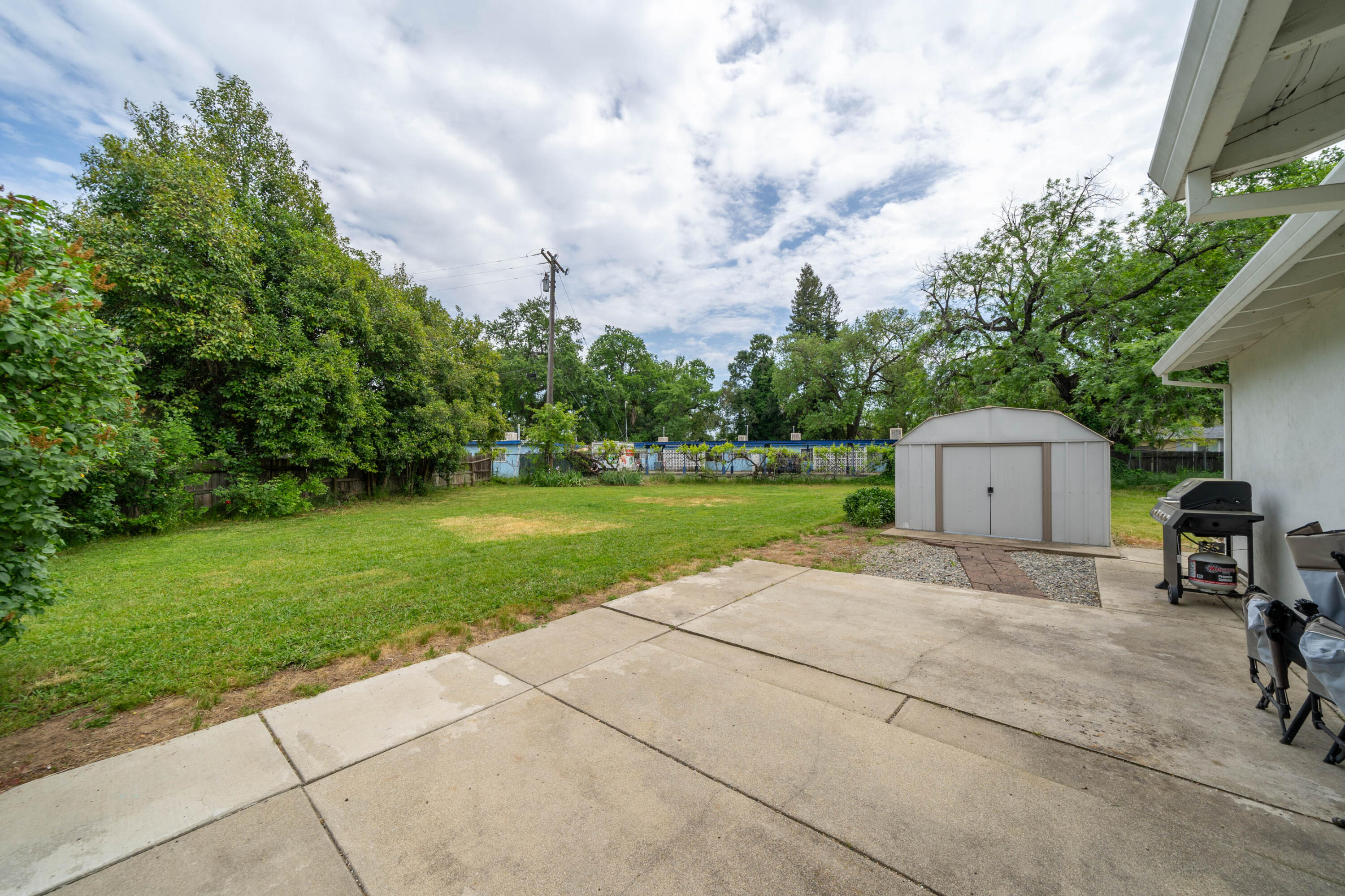 3055 Sharon Avenue Anderson, CA 96007 - Photo 25 of 52 a view of a house with backyard and garden