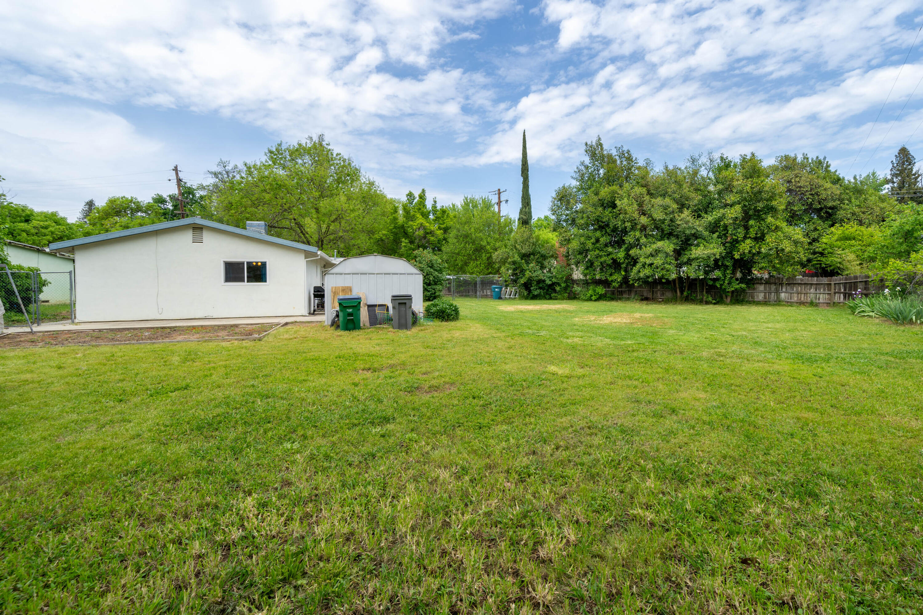 3055 Sharon Avenue Anderson, CA 96007 - Photo 34 of 52 a house view with garden space and trees