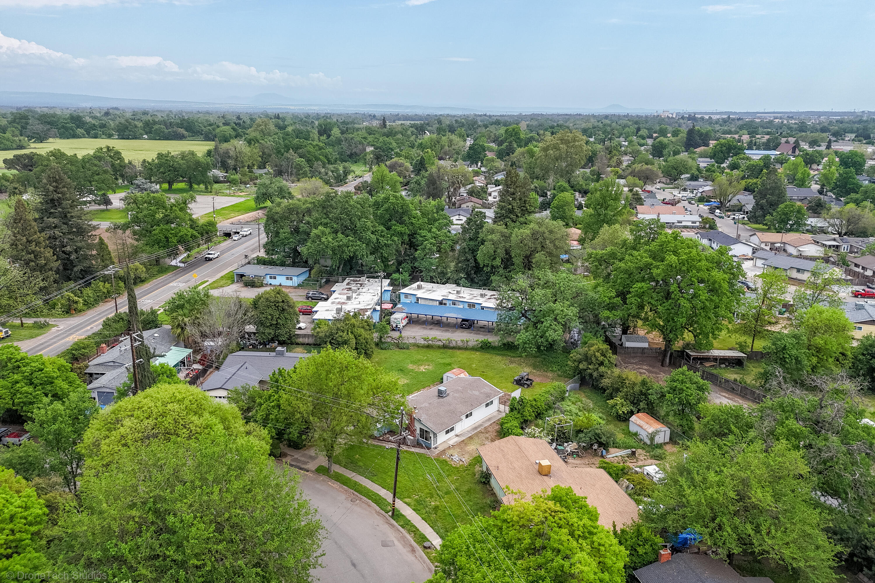 3055 Sharon Avenue Anderson, CA 96007 - Photo 42 of 52 a view of a city with lush green forest