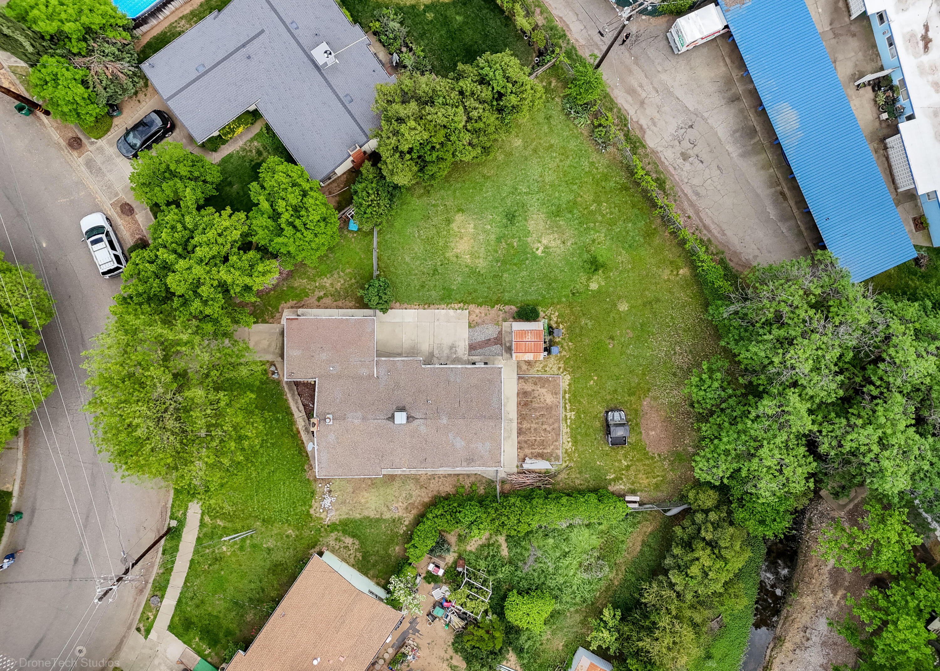 3055 Sharon Avenue Anderson, CA 96007 - Photo 52 of 52 an aerial view of a house with a yard and garden