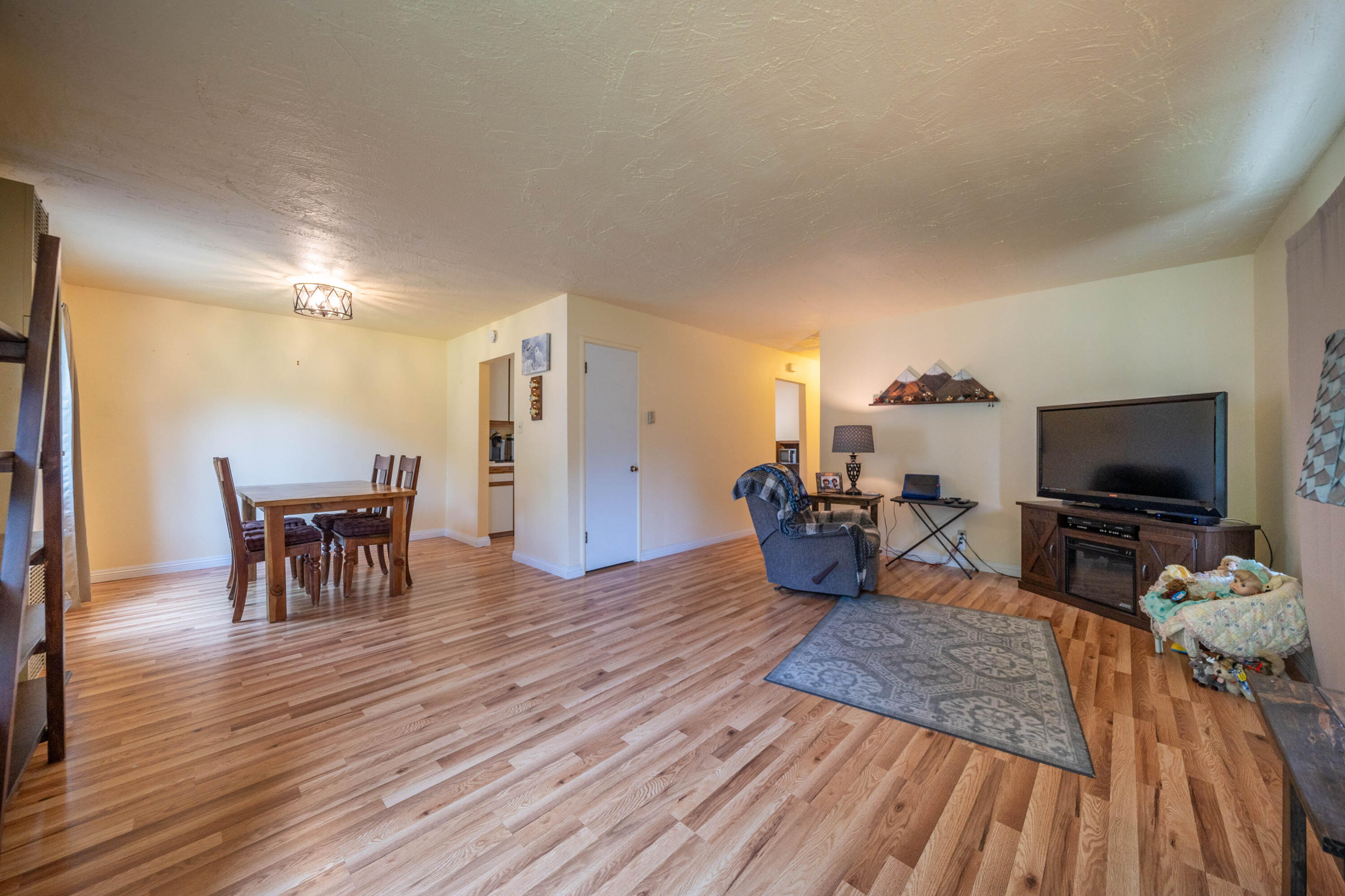 3055 Sharon Avenue Anderson, CA 96007 - Photo 9 of 52 a living room with furniture and a flat screen tv