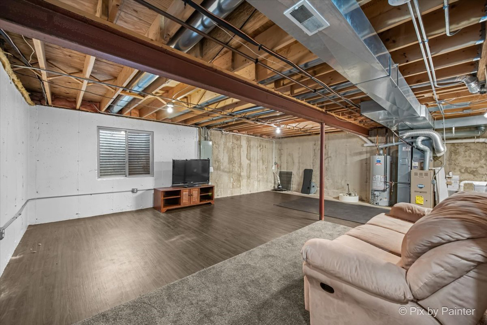 2466 Amber Lane Elgin, IL 60123 - Photo 24 of 32 a living room with furniture and a flat screen tv