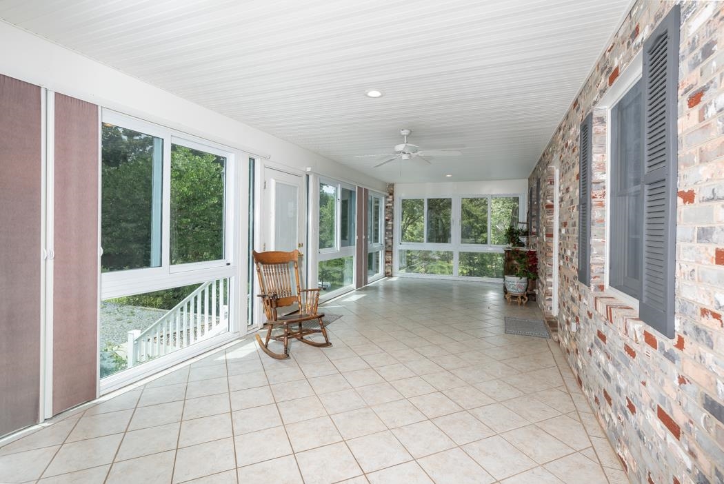 7582 Plank Road Afton, VA 22920 - Photo 7 of 50 a view of a room with a large window and sitting area