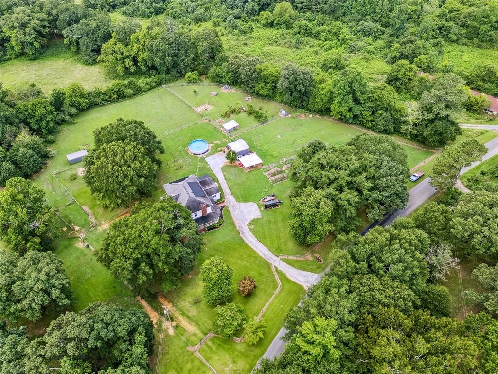 475 Evergreen Road Northeast Resaca, GA 30735 - Photo 17 of 44 an aerial view of a yard