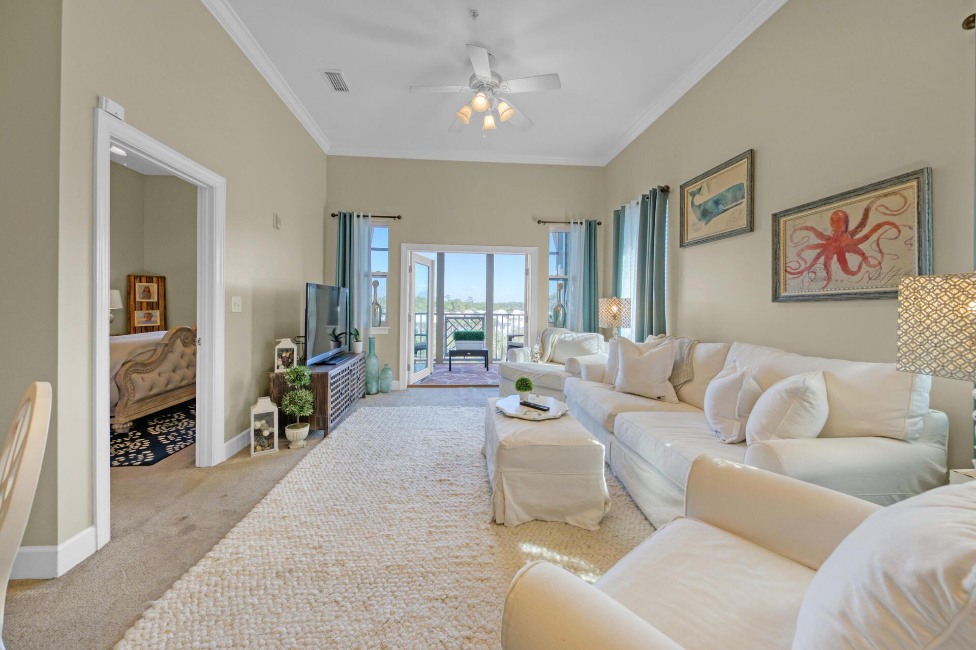 231 Somerset Bridge Road, Unit 1406 Santa Rosa Beach, FL 32459 - Photo 3 of 16 a living room with furniture and a flat screen tv