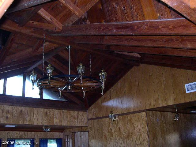1116 Marlee Road Fruit Cove, FL 32259 - Photo 4 of 4 a view of a room with gym equipment