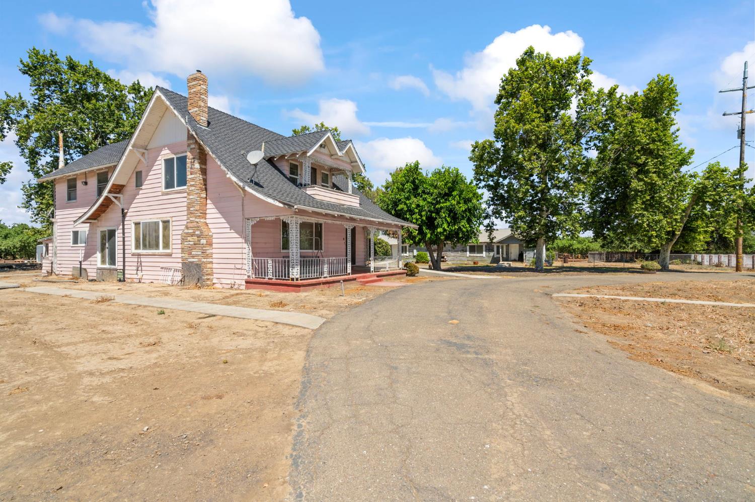 3101 River Road Vernalis, CA 95385 - Photo 2 of 81 a view of house with yard and trees in the background