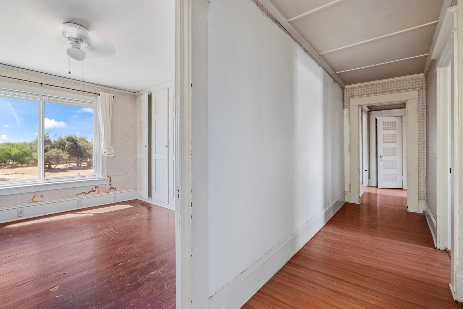 3101 River Road Vernalis, CA 95385 - Photo 26 of 81 a view of a hallway with wooden floor and a window