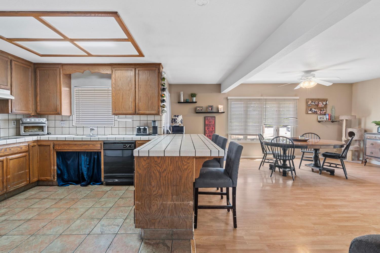 3101 River Road Vernalis, CA 95385 - Photo 52 of 81 a kitchen with a table chairs sink and cabinets