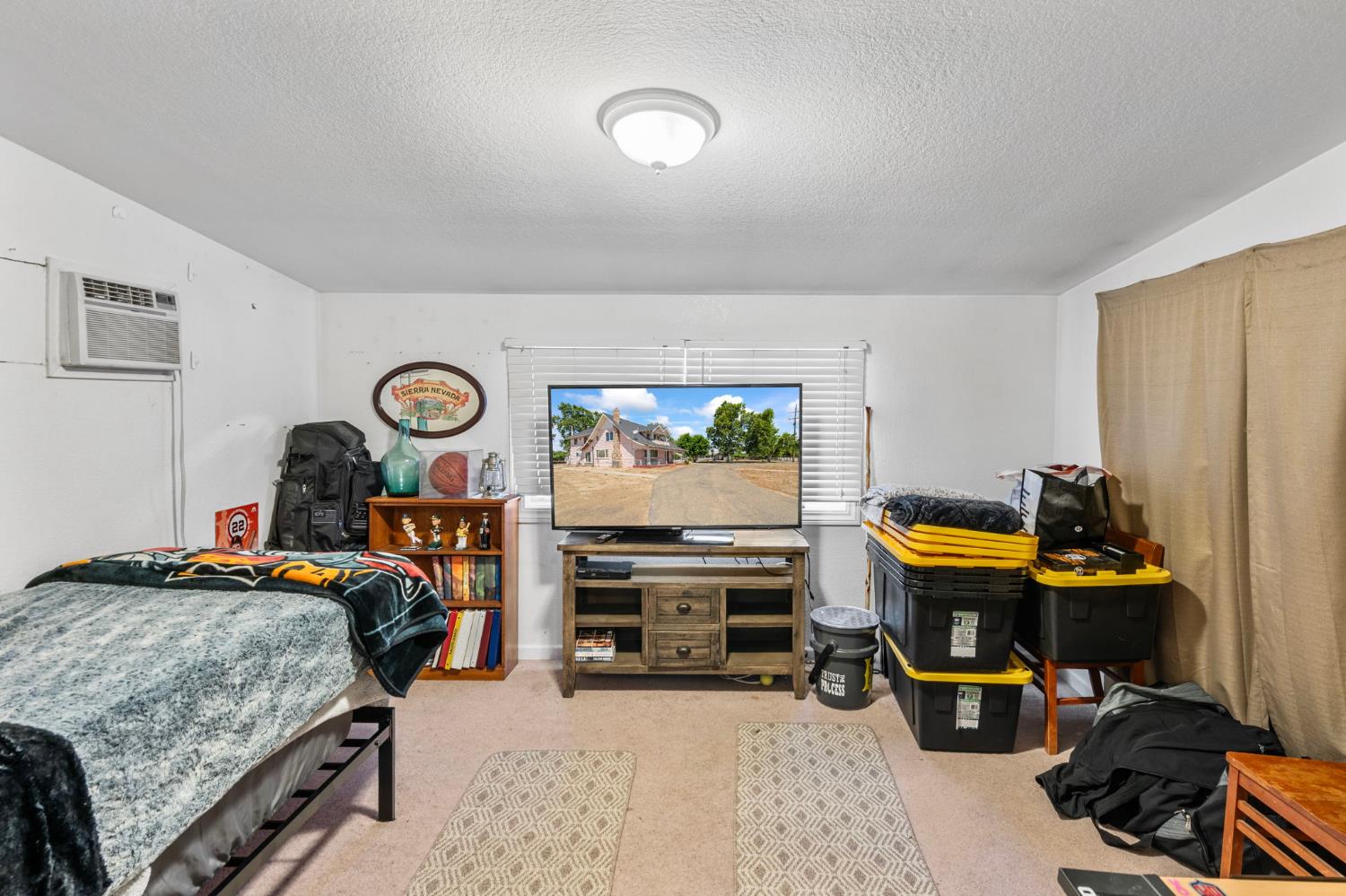 3101 River Road Vernalis, CA 95385 - Photo 60 of 81 a bedroom with furniture and a flat screen tv