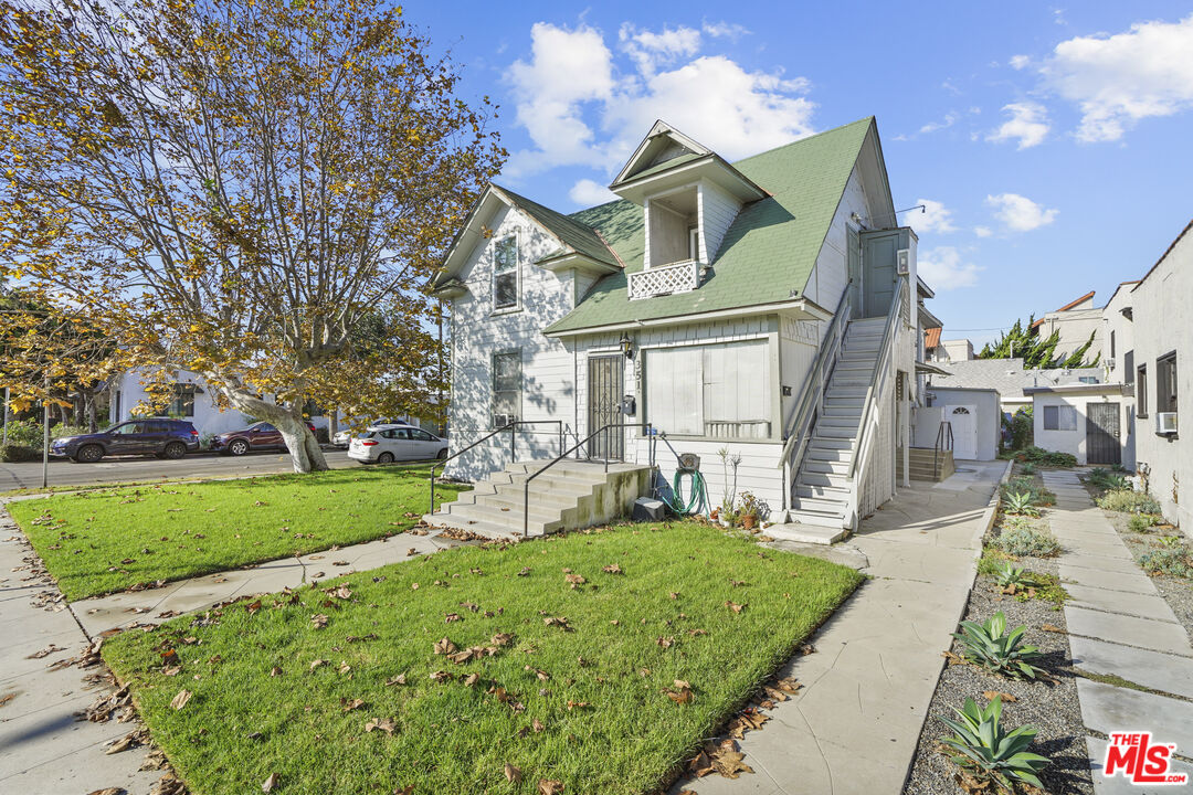 351 Temple Avenue, Unit A Long Beach, CA 90814 - Photo 1 of 18 a front view of a house with garden