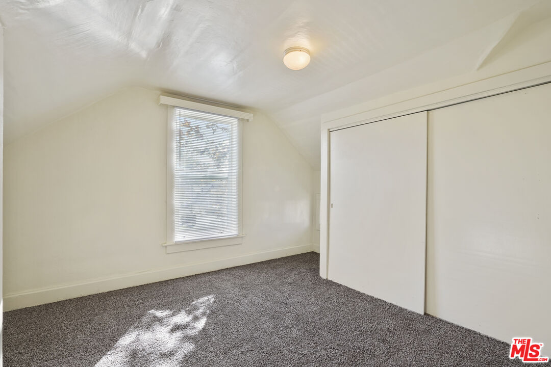 351 Temple Avenue, Unit A Long Beach, CA 90814 - Photo 12 of 18 an empty room with windows