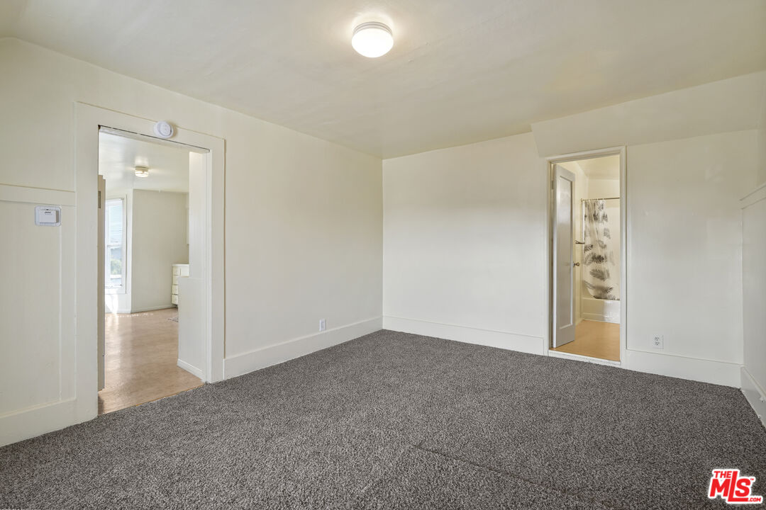 351 Temple Avenue, Unit A Long Beach, CA 90814 - Photo 3 of 18 an empty room with windows