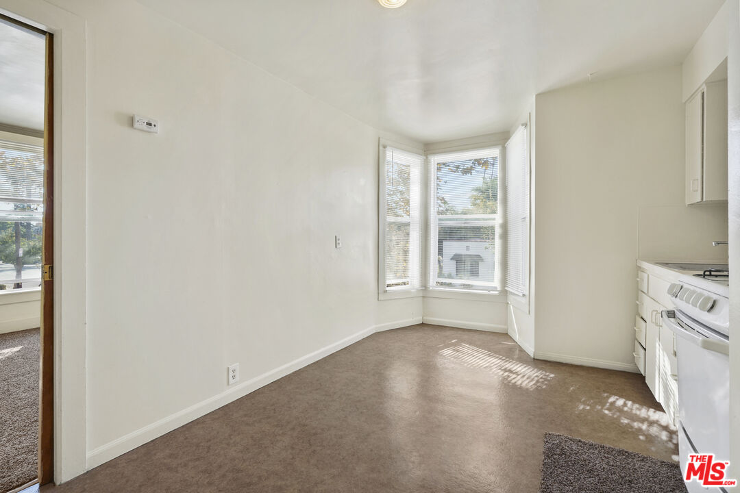 351 Temple Avenue, Unit A Long Beach, CA 90814 - Photo 8 of 18 a room with a bed and a window