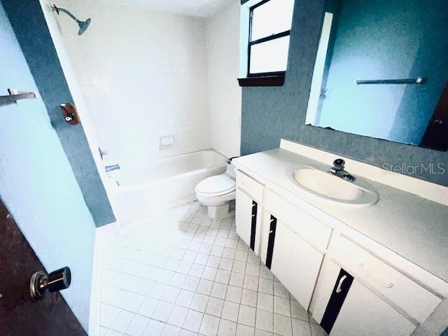 7 Brookside Circle Ormond Beach, FL 32174 - Photo 12 of 16 a bathroom with a sink a toilet and a mirror