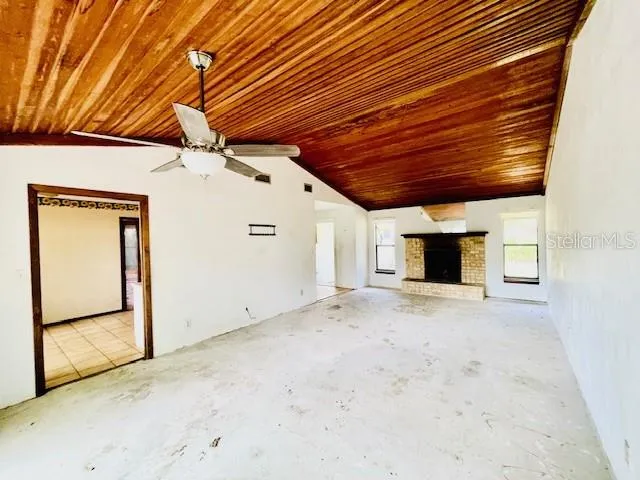 a view of a livingroom with wooden floor