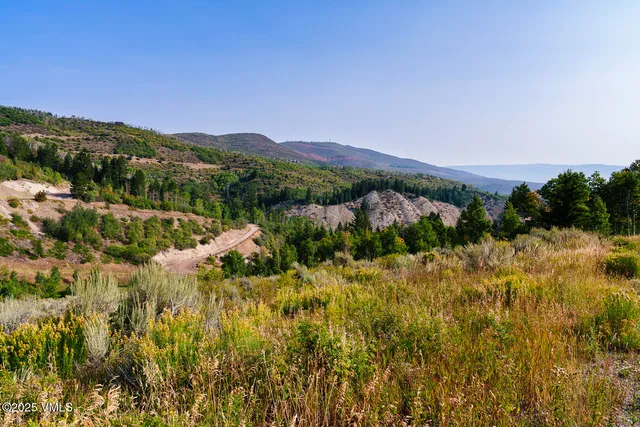a view of a houses with a yard