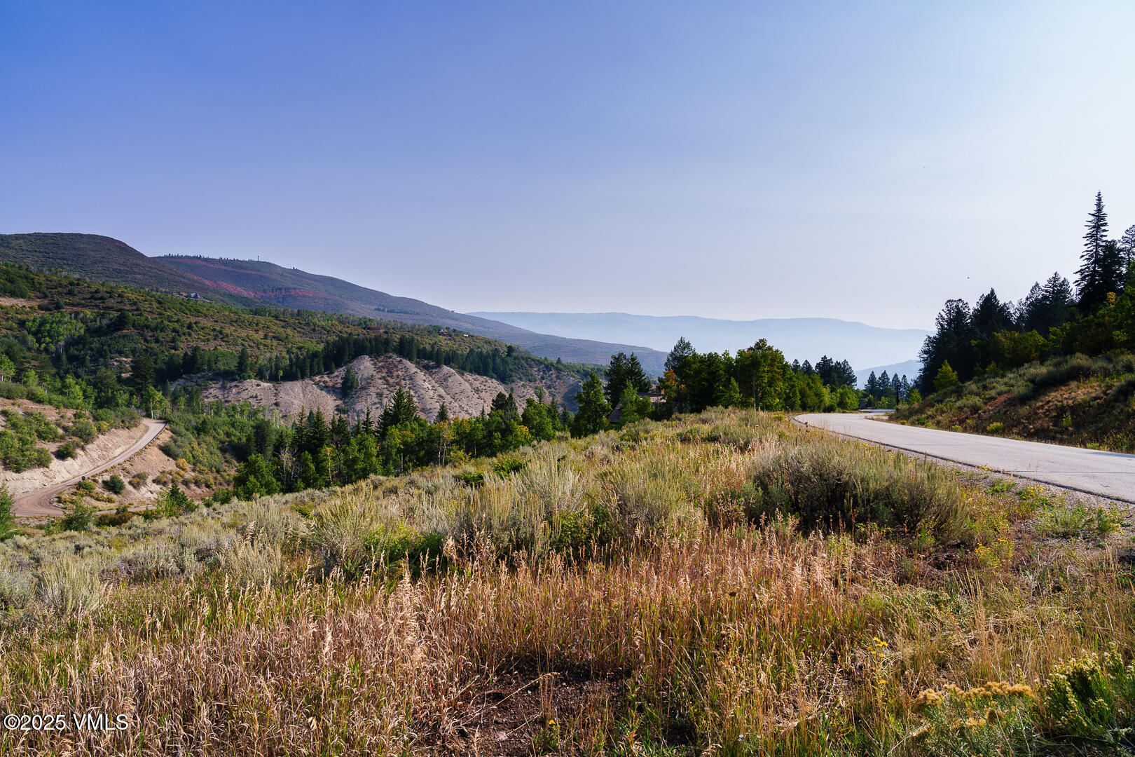 534 Graham Road Edwards, CO 81632 - Photo 7 of 54 a view of a lake and green valley