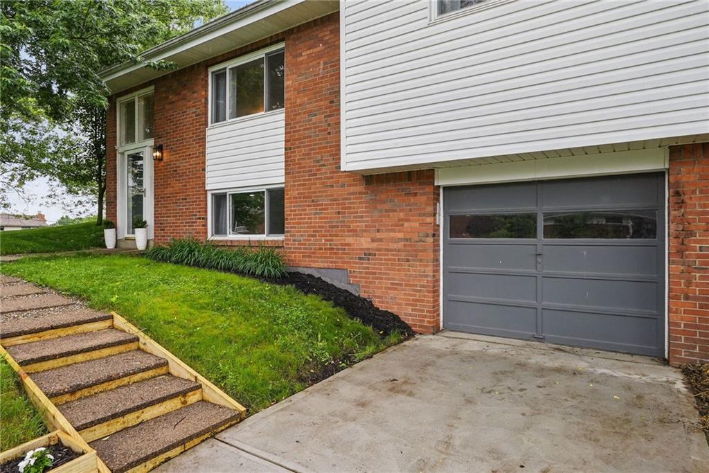244 Burch Drive Coraopolis, PA 15108 - Photo 3 of 29 a front view of a house with a yard