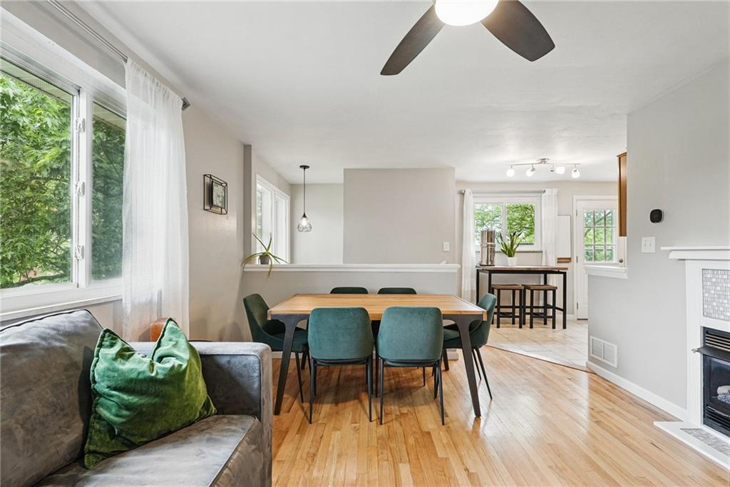 244 Burch Drive Coraopolis, PA 15108 - Photo 8 of 29 a view of a dining room with furniture and wooden floor