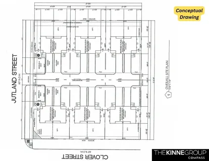 an aerial view of a house with garden space and street view