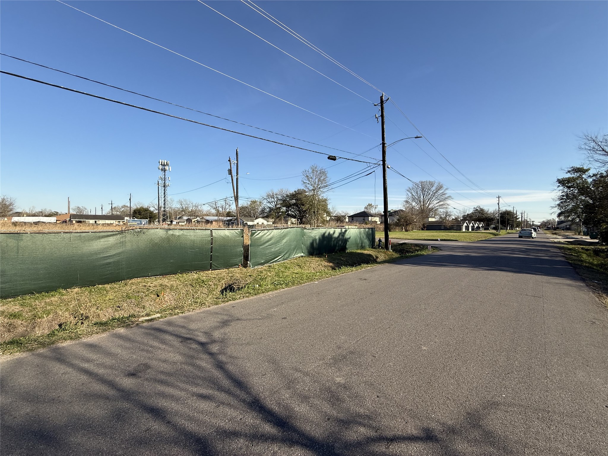 8935 Jutland Road Houston, TX 77033 - Photo 5 of 14 a view of a lake with a big yard