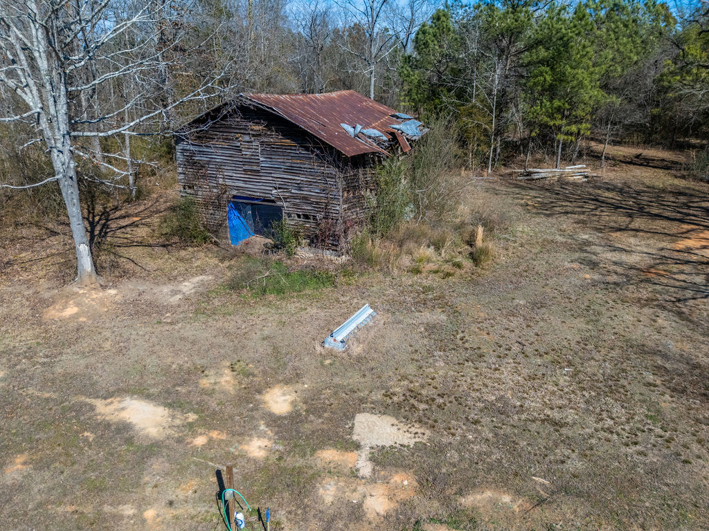 900 Asaville School Road Anderson, SC 29621 - Photo 25 of 29 This rustic barn with weathered wood siding offers a charming glimpse into the past.