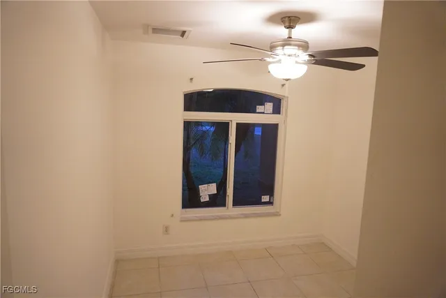 a view of an entryway with a mirror