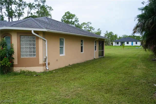 a view of a backyard with a garden