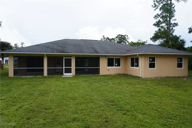 a view of a house with a garden