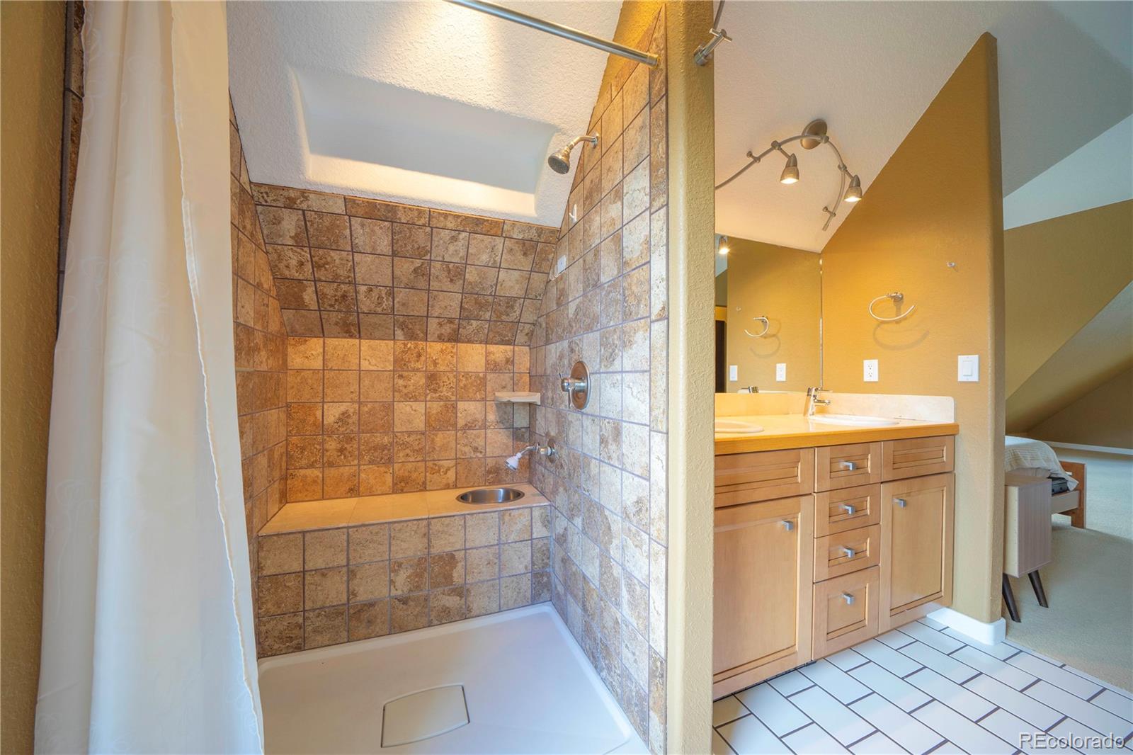 138 Teton Way Como, CO 80432 - Photo 15 of 34 a bathroom with a shower and a sink