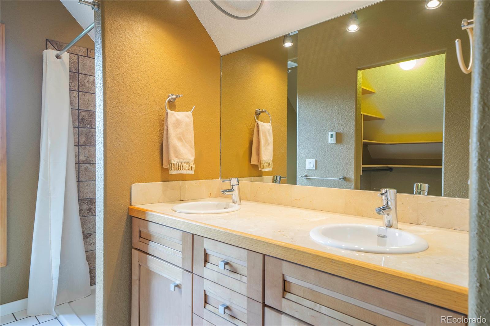 138 Teton Way Como, CO 80432 - Photo 29 of 34 a bathroom with a sink and a mirror