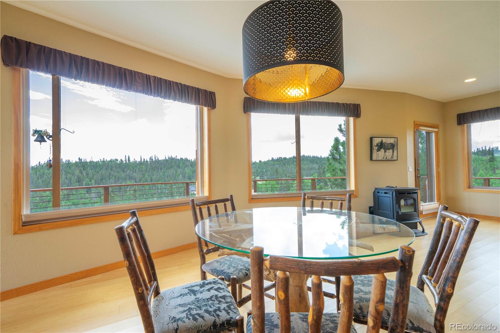 138 Teton Way Como, CO 80432 - Photo 5 of 34 a view of a dining room with furniture window and outside view