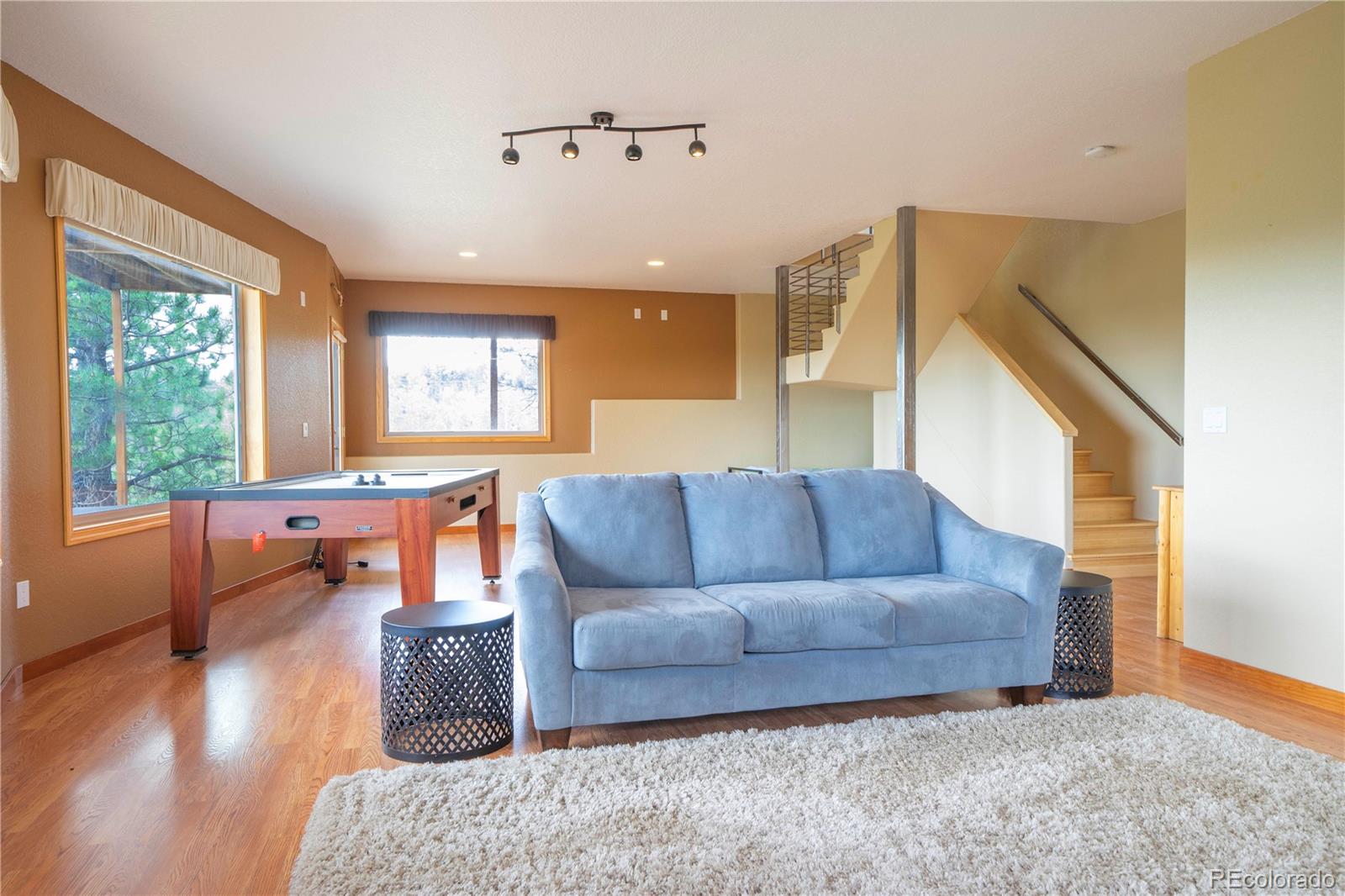 138 Teton Way Como, CO 80432 - Photo 6 of 34 a living room with furniture and a large window