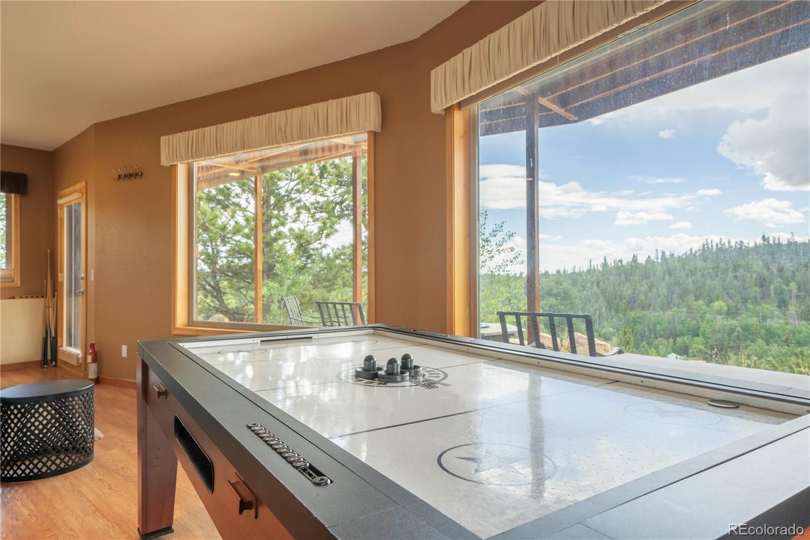 138 Teton Way Como, CO 80432 - Photo 7 of 34 a room with a large window and couch