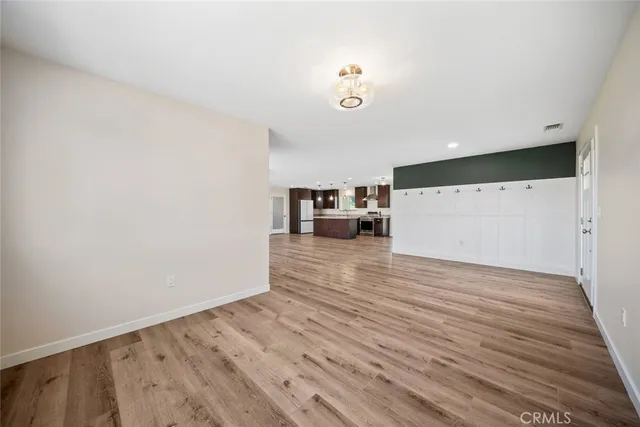 a view of a livingroom with wooden floor