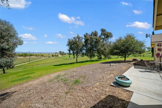 a view of a golf course with a lake