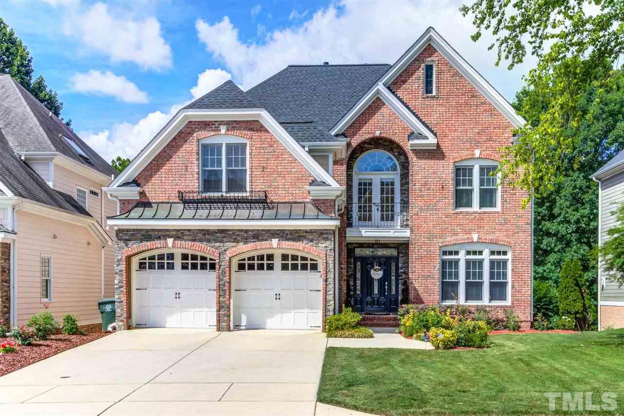 12249 Beestone Lane Raleigh, NC 27614 - Photo 1 of 29 a front view of a house with a garden