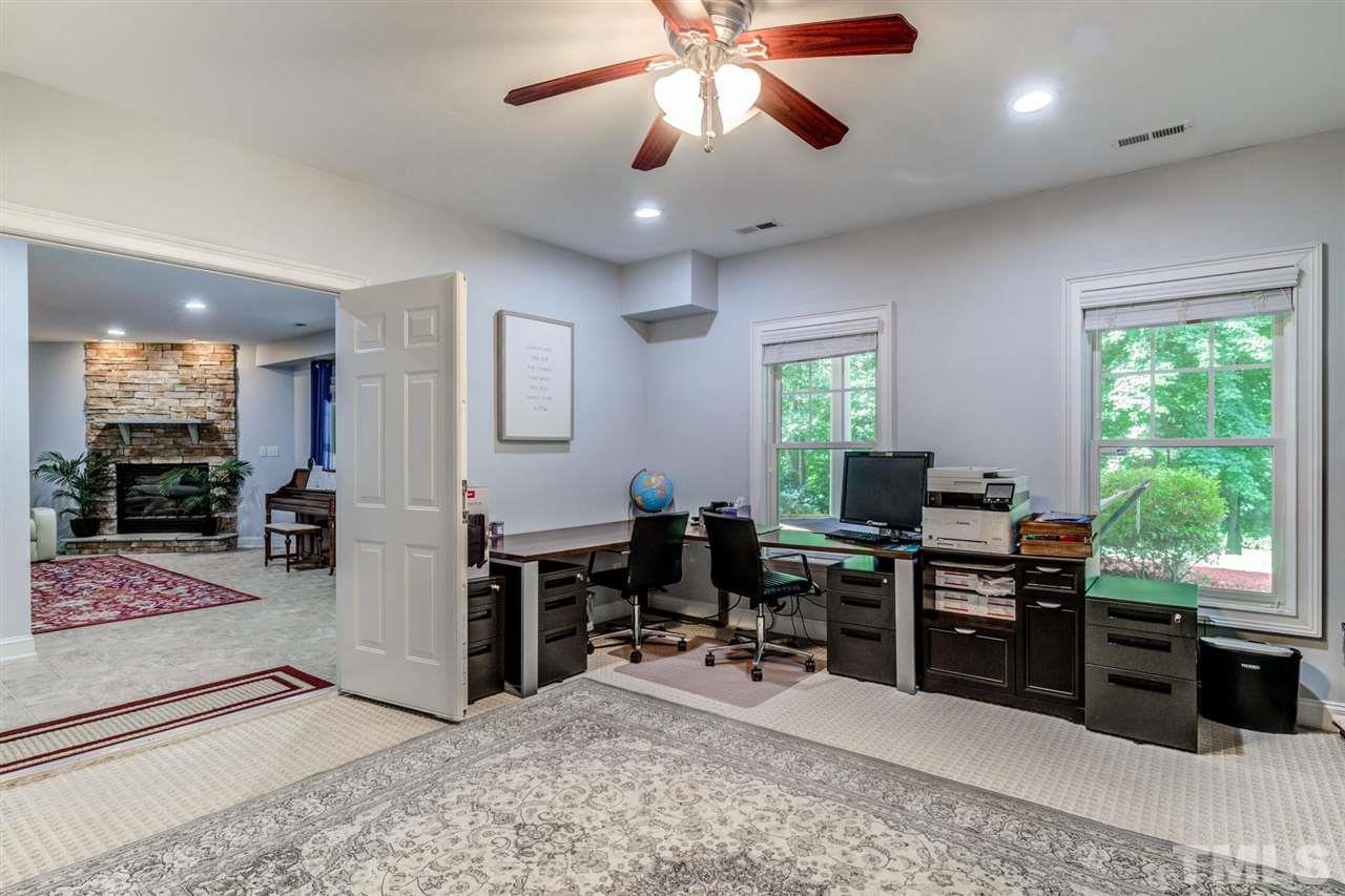 12249 Beestone Lane Raleigh, NC 27614 - Photo 15 of 29 a view of a livingroom with workspace and a window