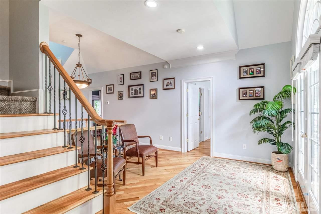 12249 Beestone Lane Raleigh, NC 27614 - Photo 19 of 29 a view of entryway livingroom and hall