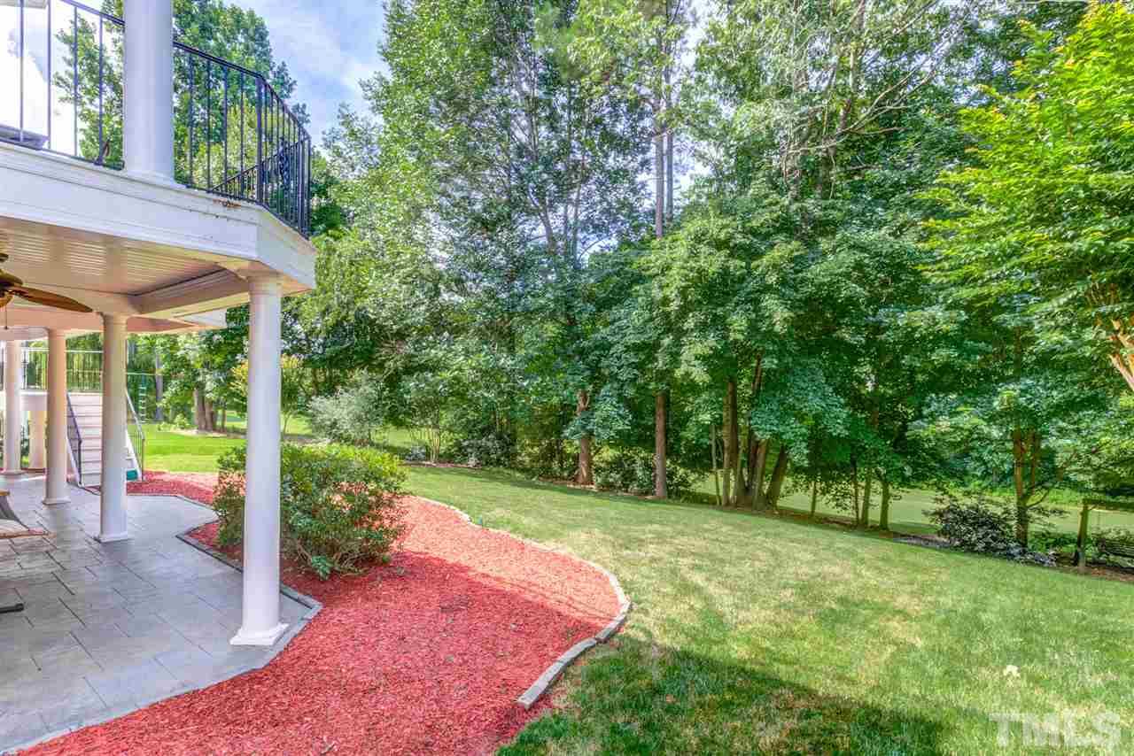 12249 Beestone Lane Raleigh, NC 27614 - Photo 28 of 29 a view of a backyard with a small cabin