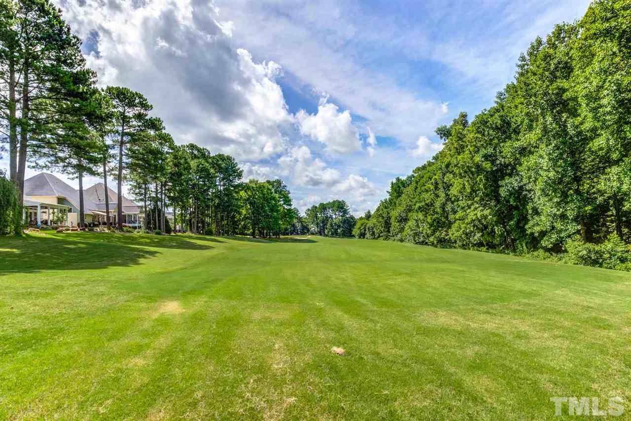 12249 Beestone Lane Raleigh, NC 27614 - Photo 29 of 29 a view of field with trees in the background