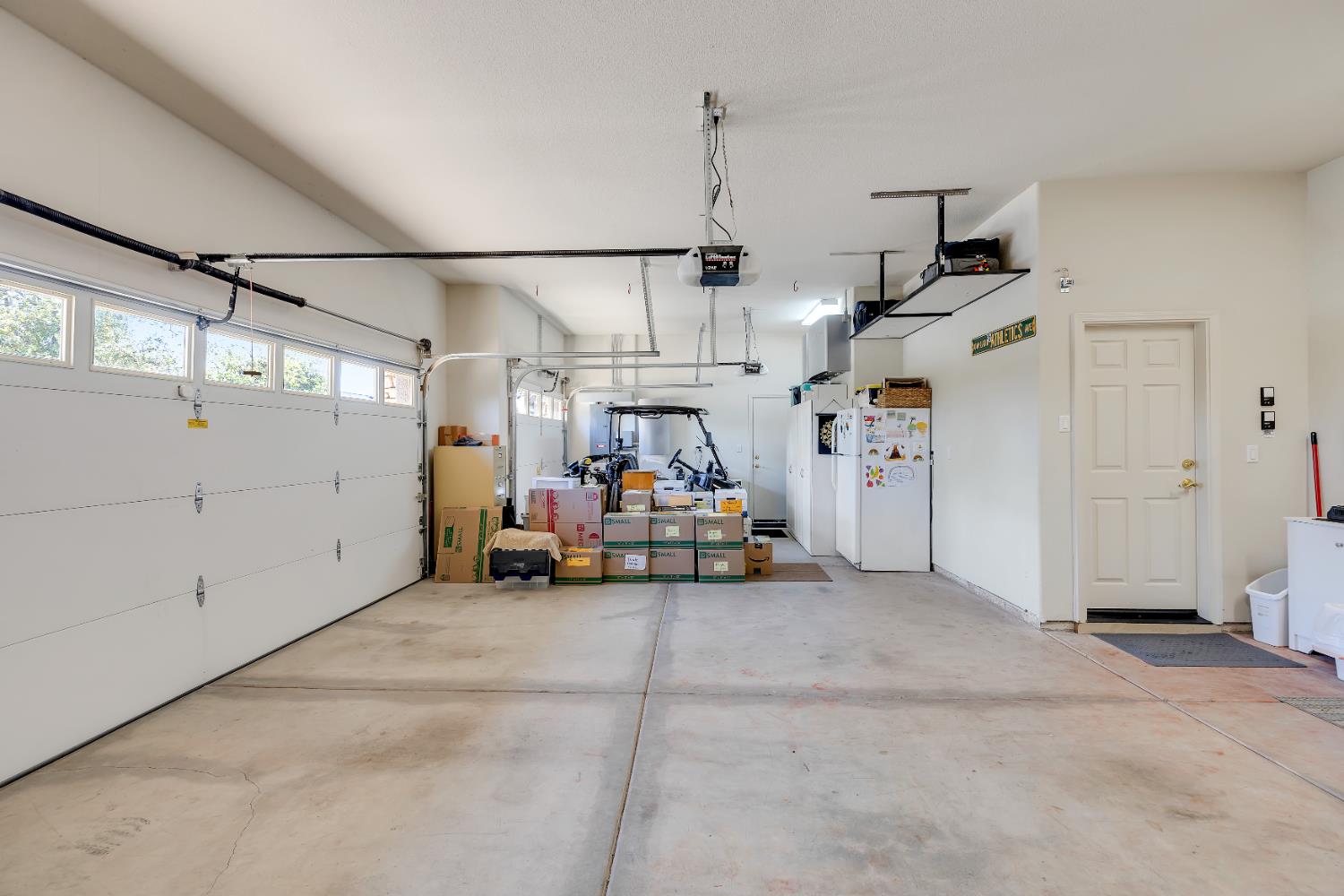 16 Rock Ridge Court, Unit 289 Copperopolis, CA 95228 - Photo 64 of 78 Large Garage. The 3rd bay is large enough for a golf cart, small car, storage, or other toys.
