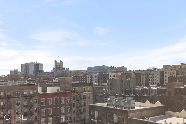 a bathroom with a bathtub a sink a toilet and a mirror