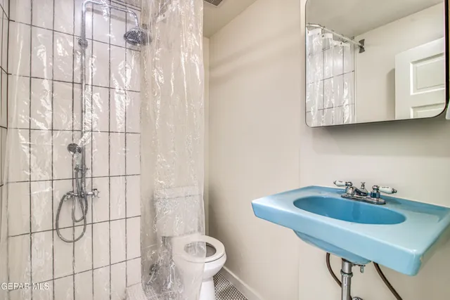 a view of a storage & utility room with closet