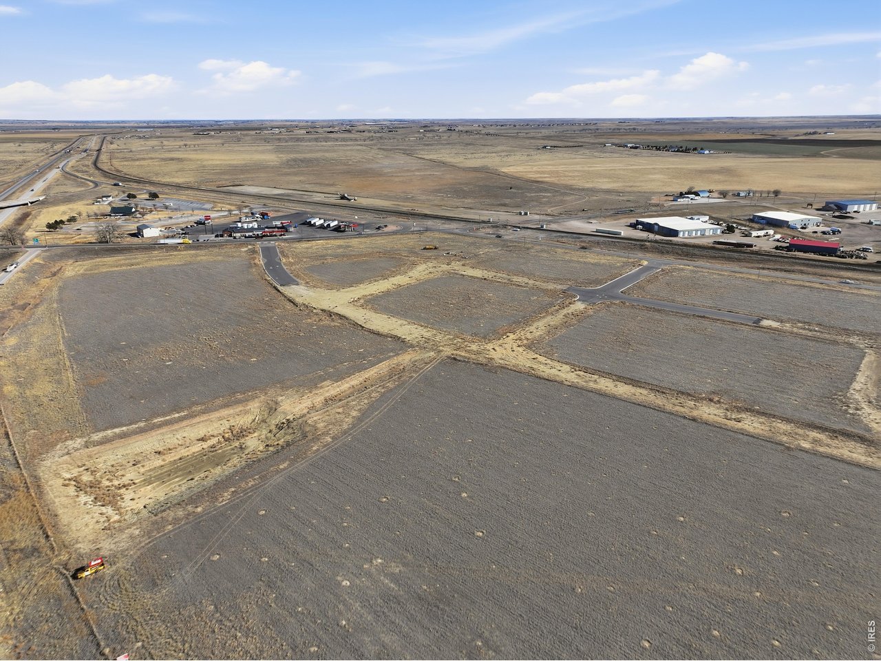 4 Tract Wiggins, CO 80654 - Photo 7 of 11 a view of an ocean and a building