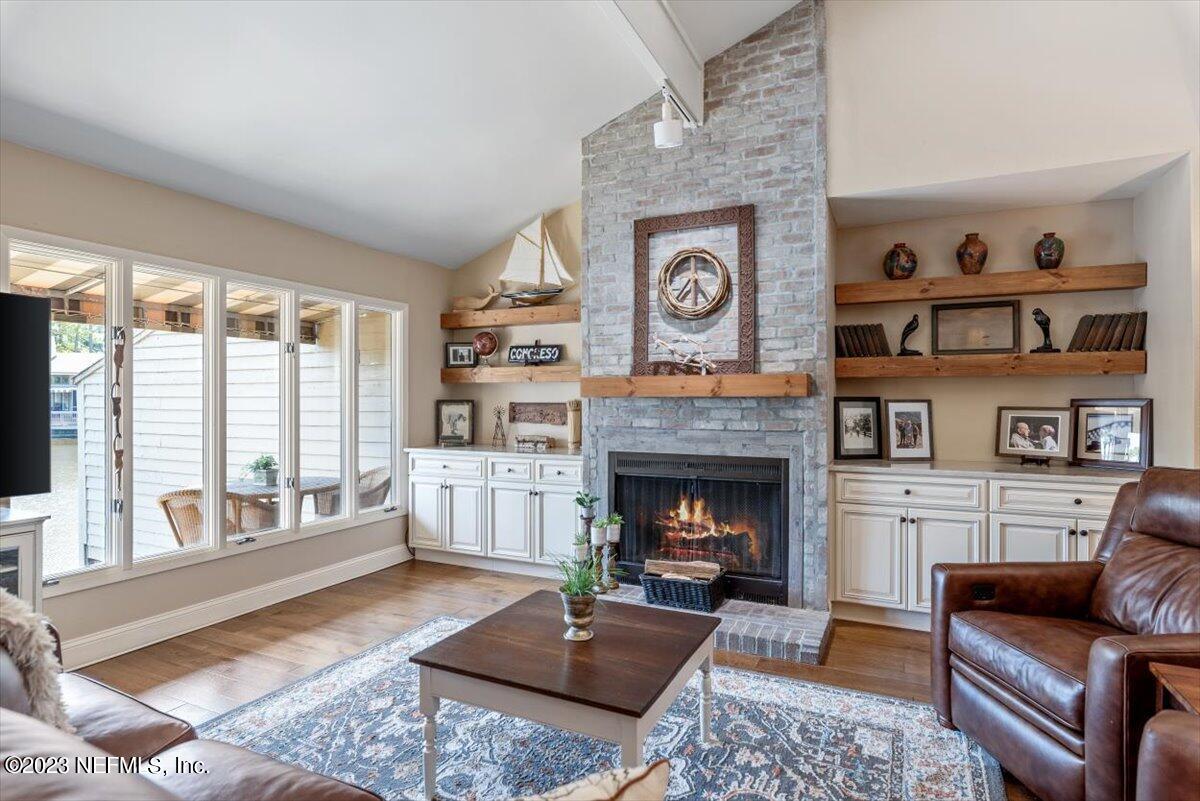 75 Fishermans Cove Road Ponte Vedra Beach, FL 32082 - Photo 12 of 47 a living room with furniture and a fireplace