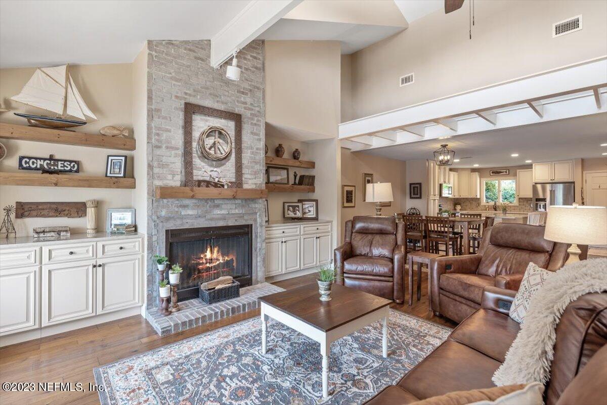 75 Fishermans Cove Road Ponte Vedra Beach, FL 32082 - Photo 13 of 47 a living room with furniture and a fireplace