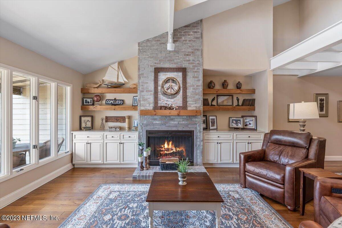 75 Fishermans Cove Road Ponte Vedra Beach, FL 32082 - Photo 15 of 47 a living room with furniture and a fireplace