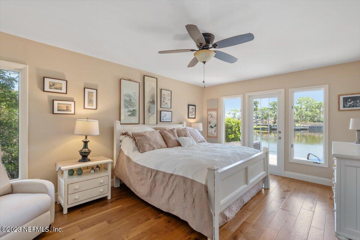 75 Fishermans Cove Road Ponte Vedra Beach, FL 32082 - Photo 19 of 47 a spacious bedroom with a bed and a large window